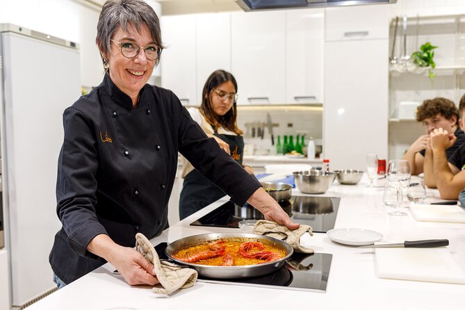 Tapas & Paella Cooking Class in Madrid with a Professional Chef - Russian salad and ham croquettes begin the meal
