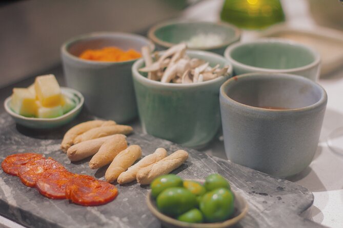 Taste of Spain: Tapas Cooking Class with Bottomless Wine Pairing - Timing, access, and booking details
