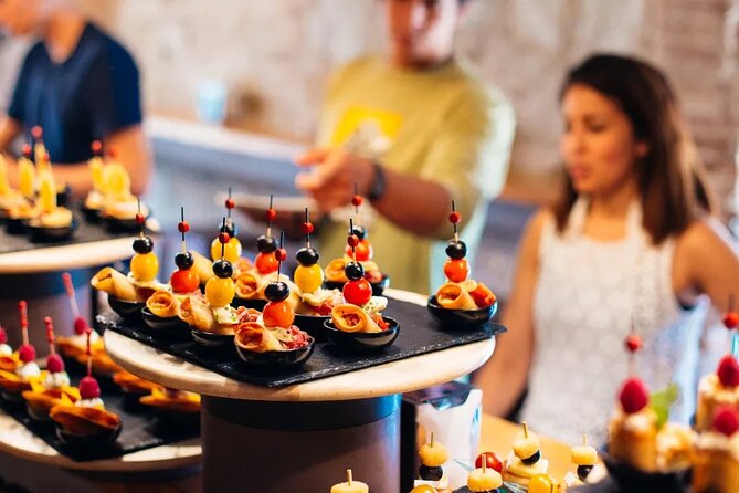 Tasty Tapas & Drinks Tour with a Rooftop Included - Starting at Tirso de Molina in the Literary Quarter