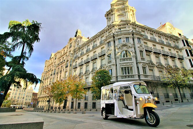 Tour of Historic and Modern Madrid with a guide in a yellow tuk tuk - From the cathedral to Madrid’s food culture