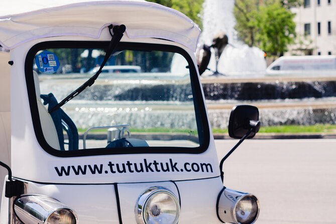 Tour of Historic and Modern Madrid with a guide in a yellow tuk tuk - The great artery and modern Madrid