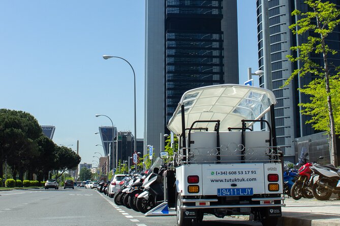 Tour of Historic and Modern Madrid with a guide in a yellow tuk tuk - Congress, churches, and the royal center